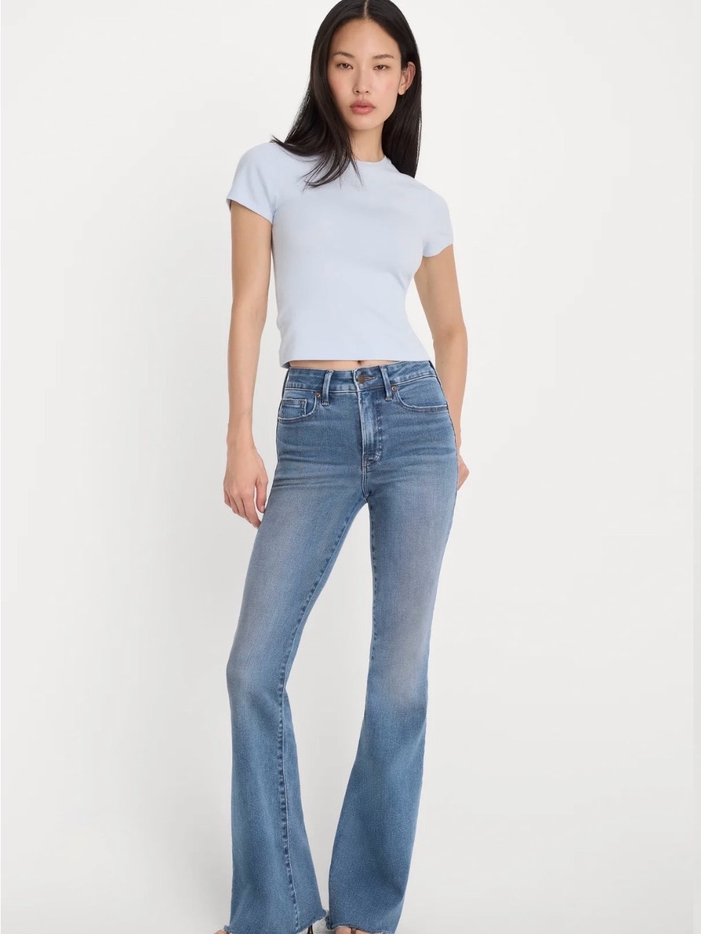 Good American Medium Blue Mid-Rise Flare Jeans With Raw Hem